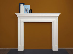 Contemporary style elegant fire surround made of limestone