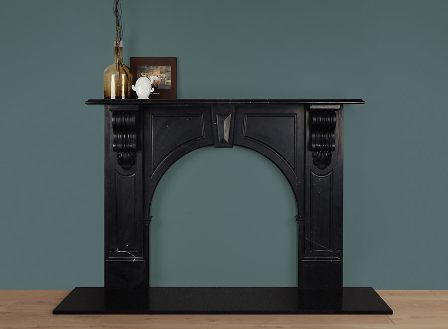 Nero Marquina marble Victorian arched fireplace