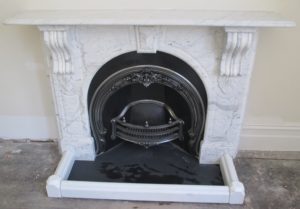 Victorian fully restored antique arched fireplace with corbels and drops made of Italian White Carrara