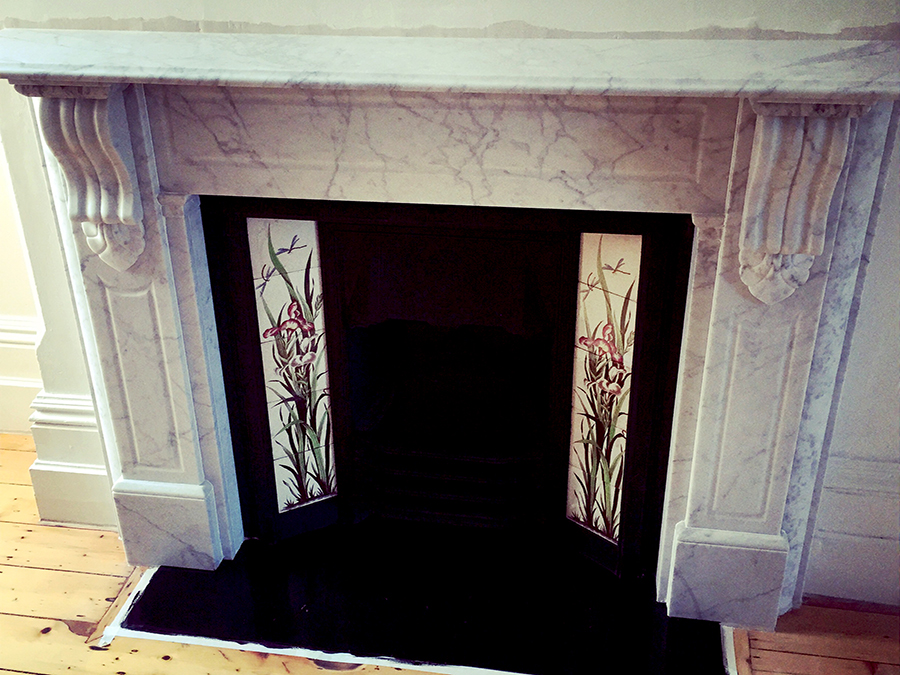Victorian fully restored antique lintel fireplace with corbels and drops made of Italian White Carrara with a granite hearth