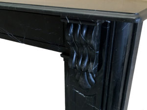 Victorian style lintel fireplace made of Black Marquina marble