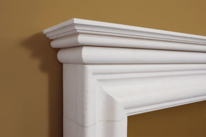 Contemporary style elegant fire surround made of limestone