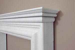 Contemporary style elegant fire surround made of white marble