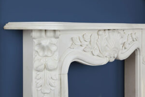 white marble fireplace surround