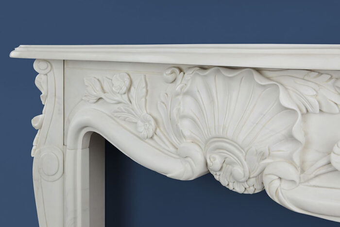 white marble fireplace surround