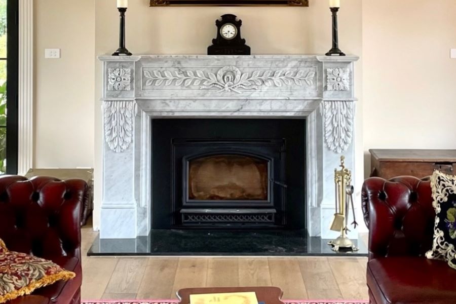 Neoclassical style fireplace made of Italian white Carrara marble